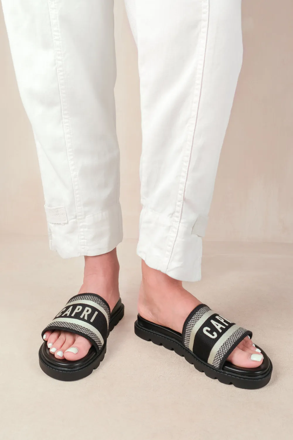 MOON FLAT SANDAL WITH TEXT DETAILING AND PRINTED SOLE IN BLACK